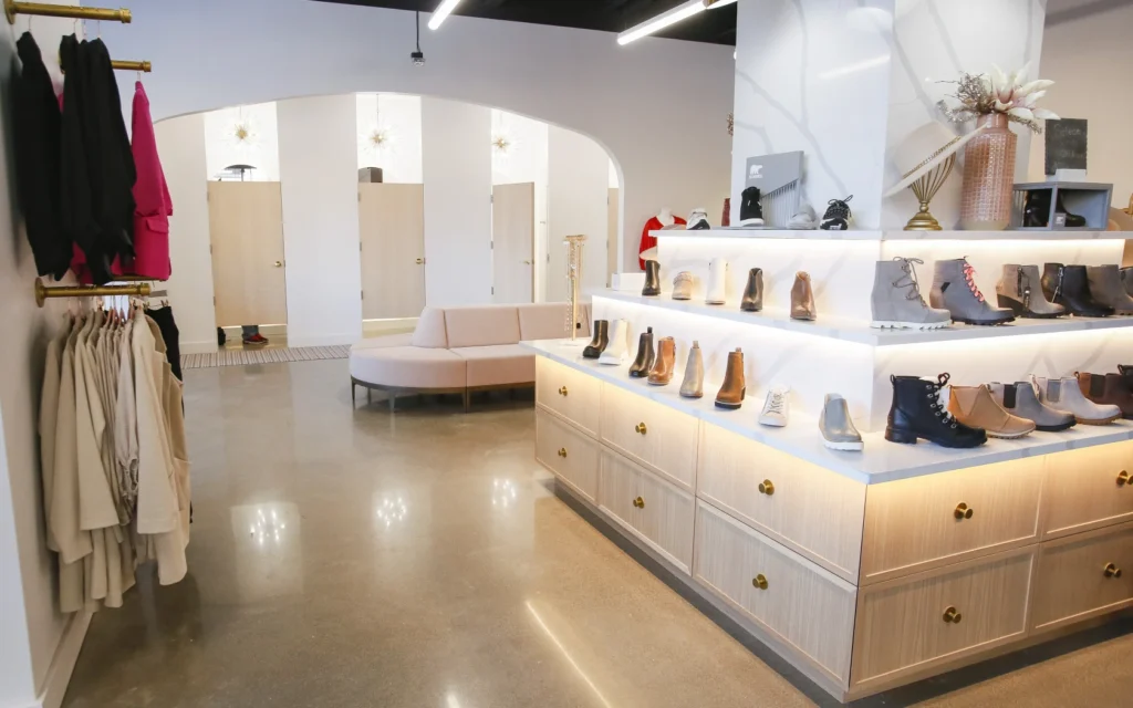 The Nines - Boutique - Fargo, North Dakota - Unique shoe display and arched dressing room area