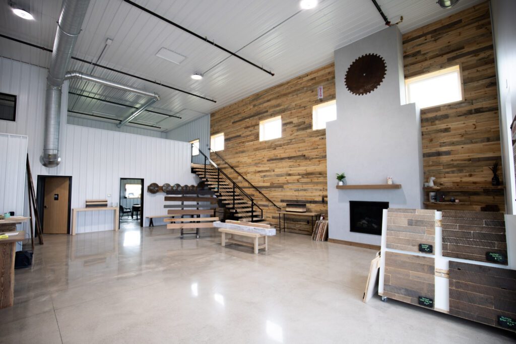 Signature reclaimed wood wall in the Dakota Timber lobby