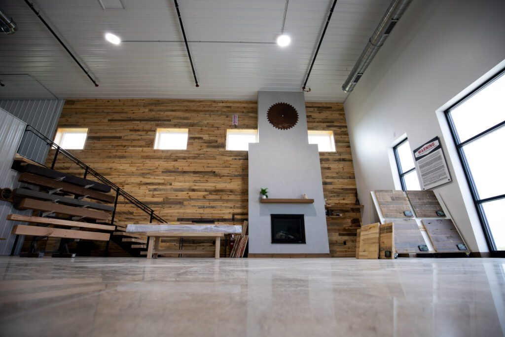 Signature reclaimed wood wall in the Dakota Timber lobby