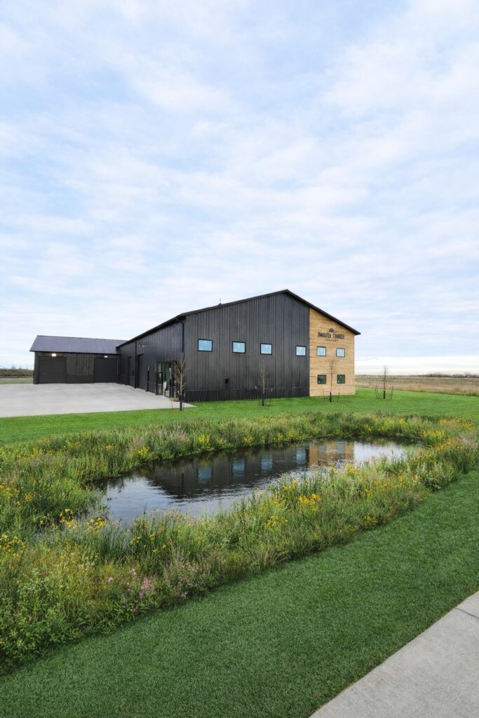 Dakota Timber in Horace, North Dakota - Exterior with black panels and wood accent