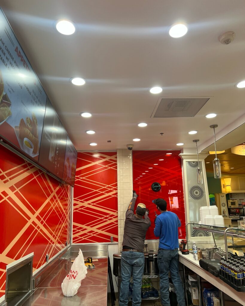 Crews worked to install red panels