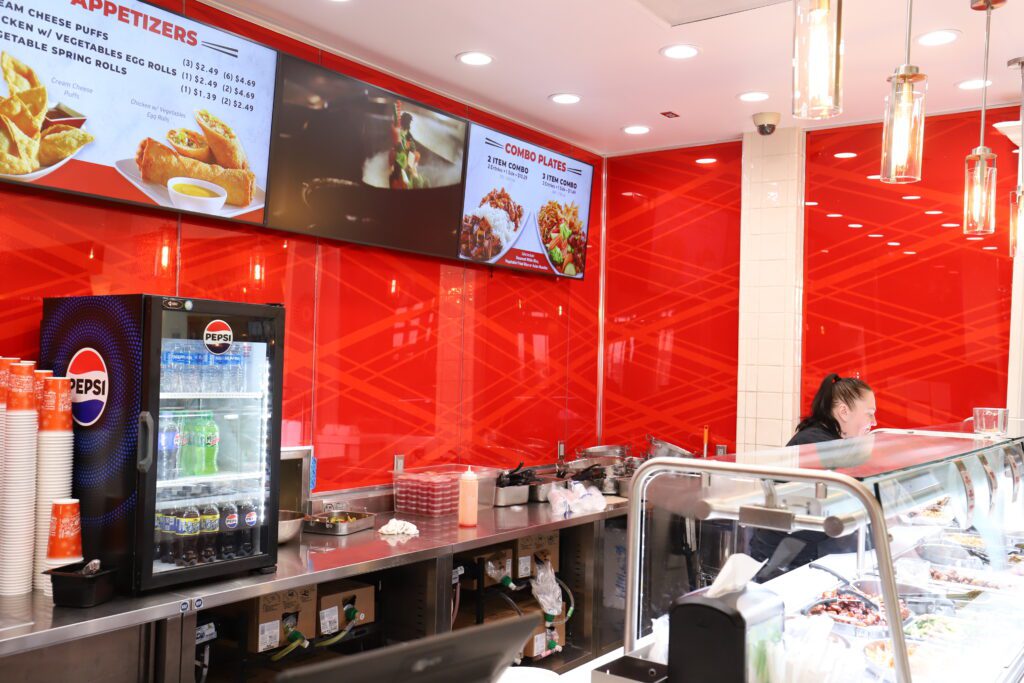 Red graphics with a glass overlay accentuate the space
