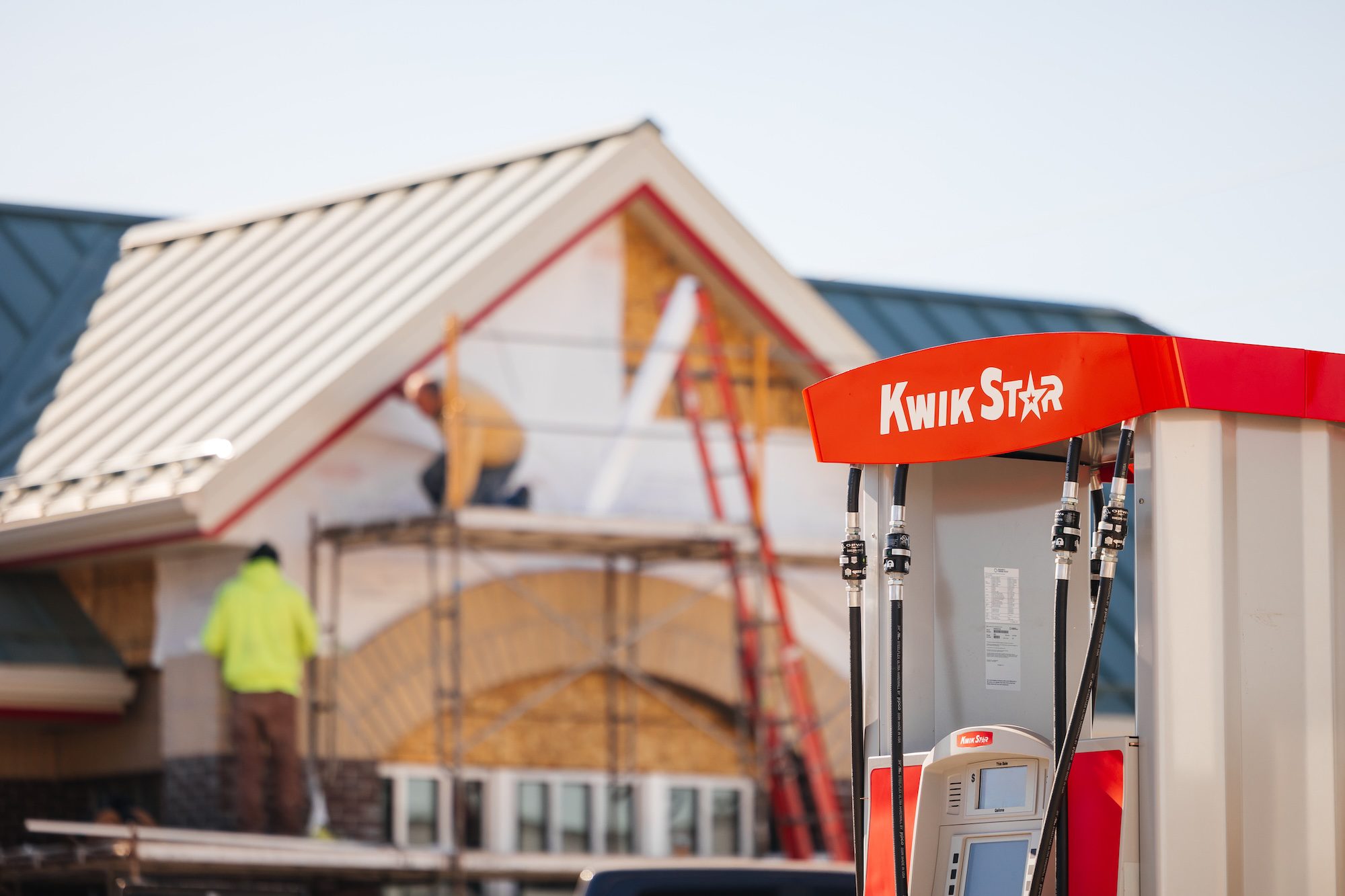 Workers construct the facade at the Kwik Star in Fargo, North Dakota