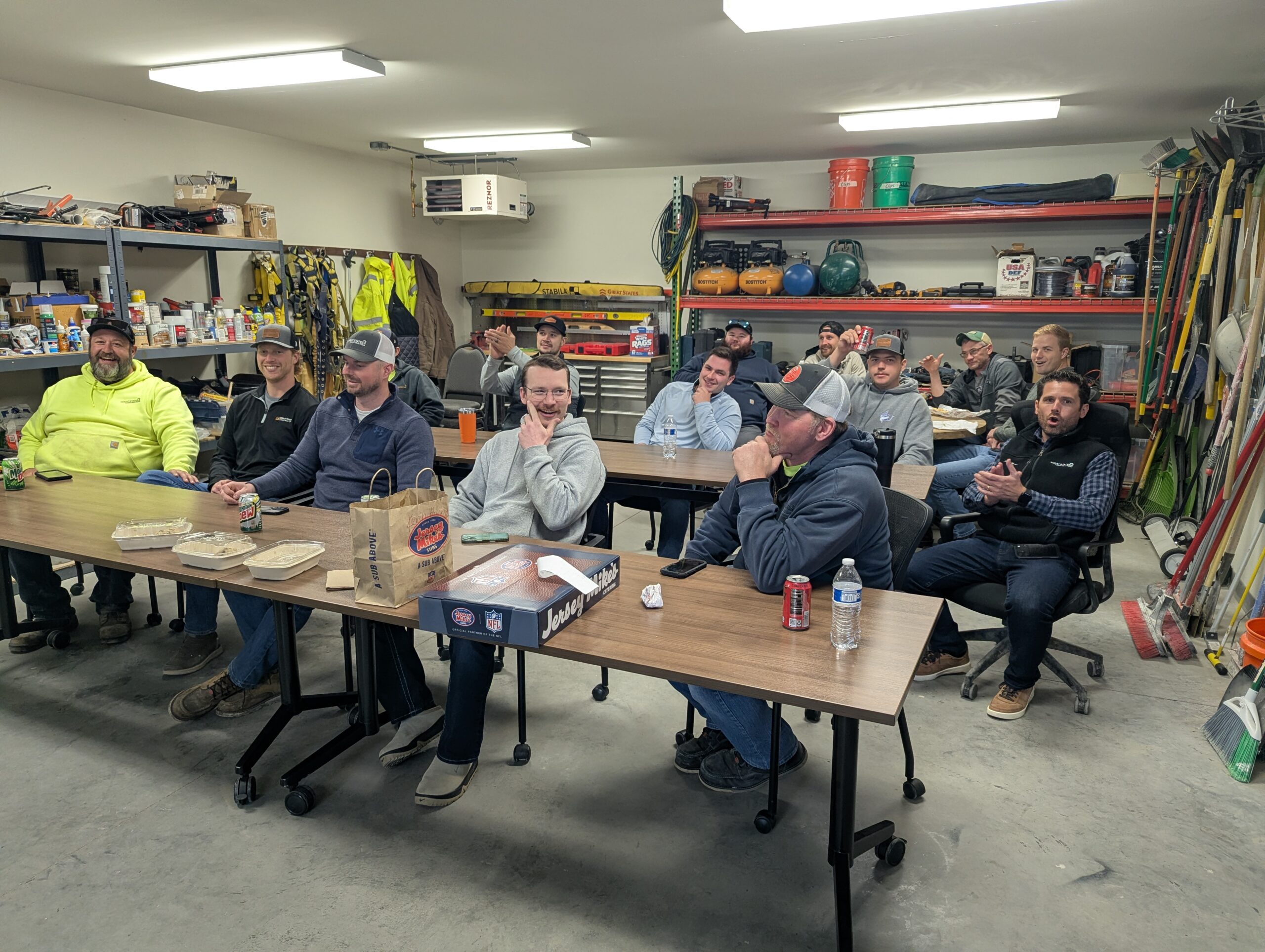 Team members from Great States Construction gather for safety training