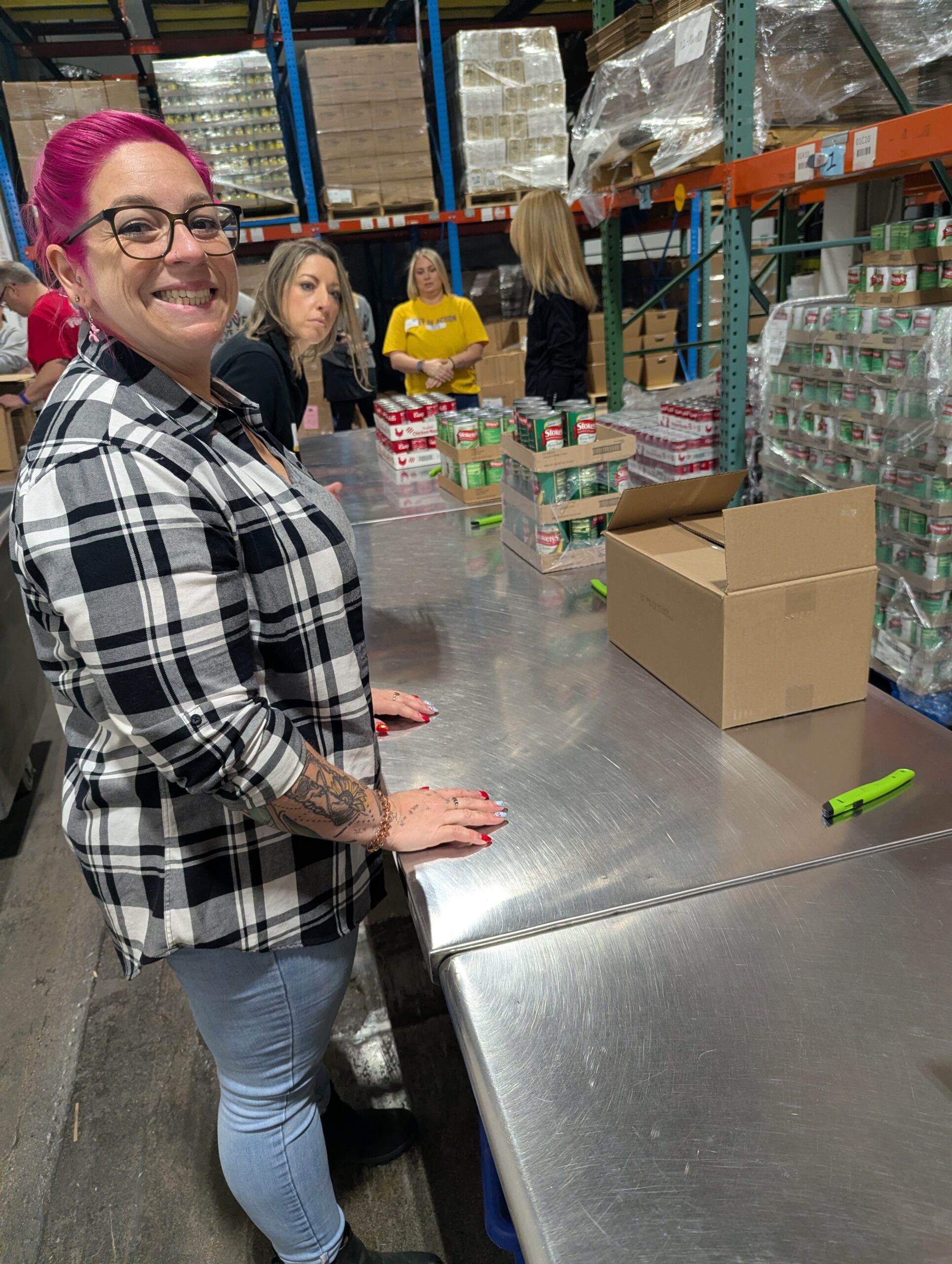 Kayla gets ready to pack boxes