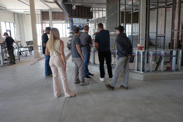Derek and Janae during a construction meeting with the Great States Construction Team