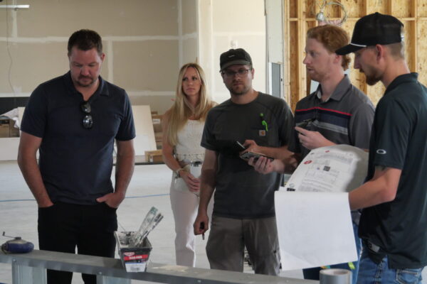 Derek and Janae during a construction meeting with the Great States Construction Team