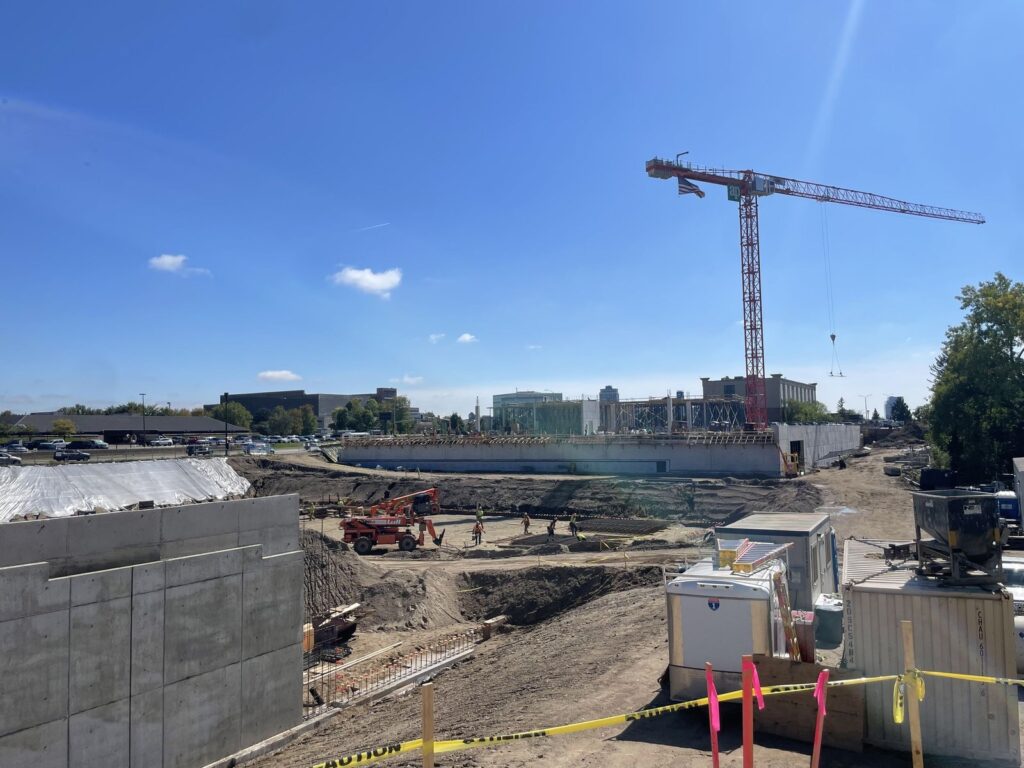 Tower crane and excavation at The Setting on France construction site in Edina, Minnesota